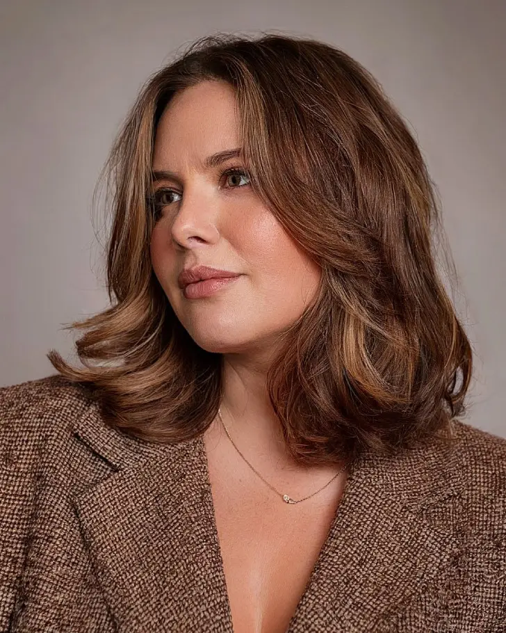 Шикарная прическа для круглого лица