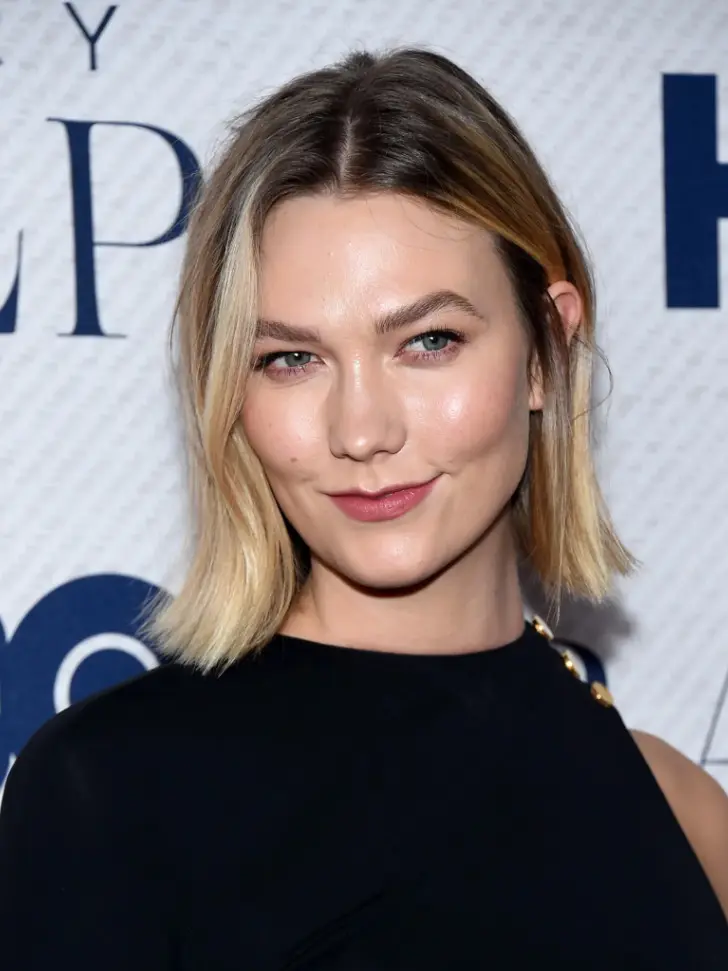 Элегантный боб с ровными кончиками и волосами спрятанными за ухо